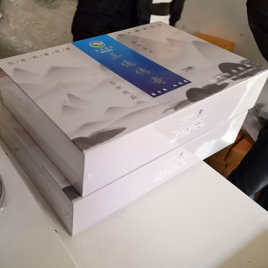 Günstiger Preis Preis Notizbuch Schrumpfverpackungsmaschine Bremsbelag Buchfolie Schrumpfverpackungsmaschine